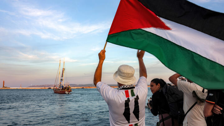 Activists see off boats in the Gaza aid flotilla departing from Tunisia's northern port of Bizerte on September 14, 2025