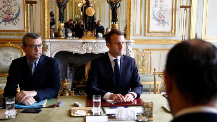 Macron considers 'strong gesture' to end fiery tax protests