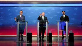 New York mayoral candidates Andrew Cuomo,  Curtis Sliwa and  Zohran Mamdani participate in a debate, in New York on October 16, 2025.