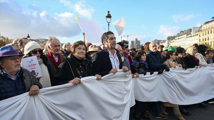 (From L-R) Director of the Théâtre du Rond-Point Jean-Michel Ribes, French actor Isabelle Adjani and French actor Macha Méril take part in a silent march with other celebrities and artists for peace in the Middle East in Paris on November 19, 2023.