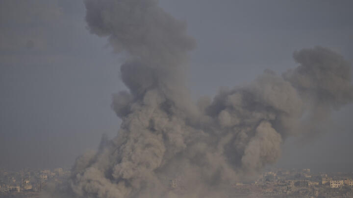 Smoke from an explosion rises in the northern Gaza Strip, as seen from a southern Israel location on Sunday, July 13, 2025.