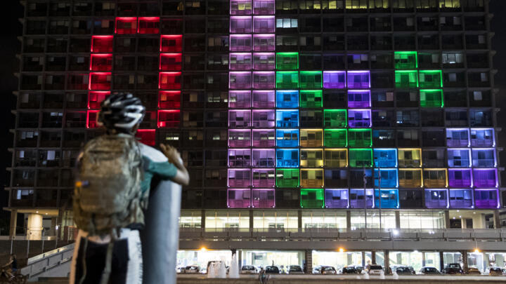A file photo showing a child participating in a giant Tetris tournament projected on the façade of a building in Tel Aviv on August 30, 2016.