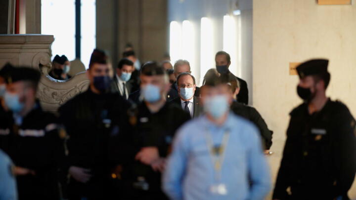 Former French president Francois Hollande arrives for the trial of the Paris' November 2015 attacks at the Paris courthouse on the Ile de la Cite, in Paris, France, November 10, 2021. 