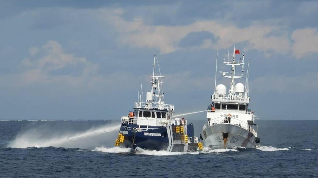 China and Philippines trade blame over boat collision near disputed islands