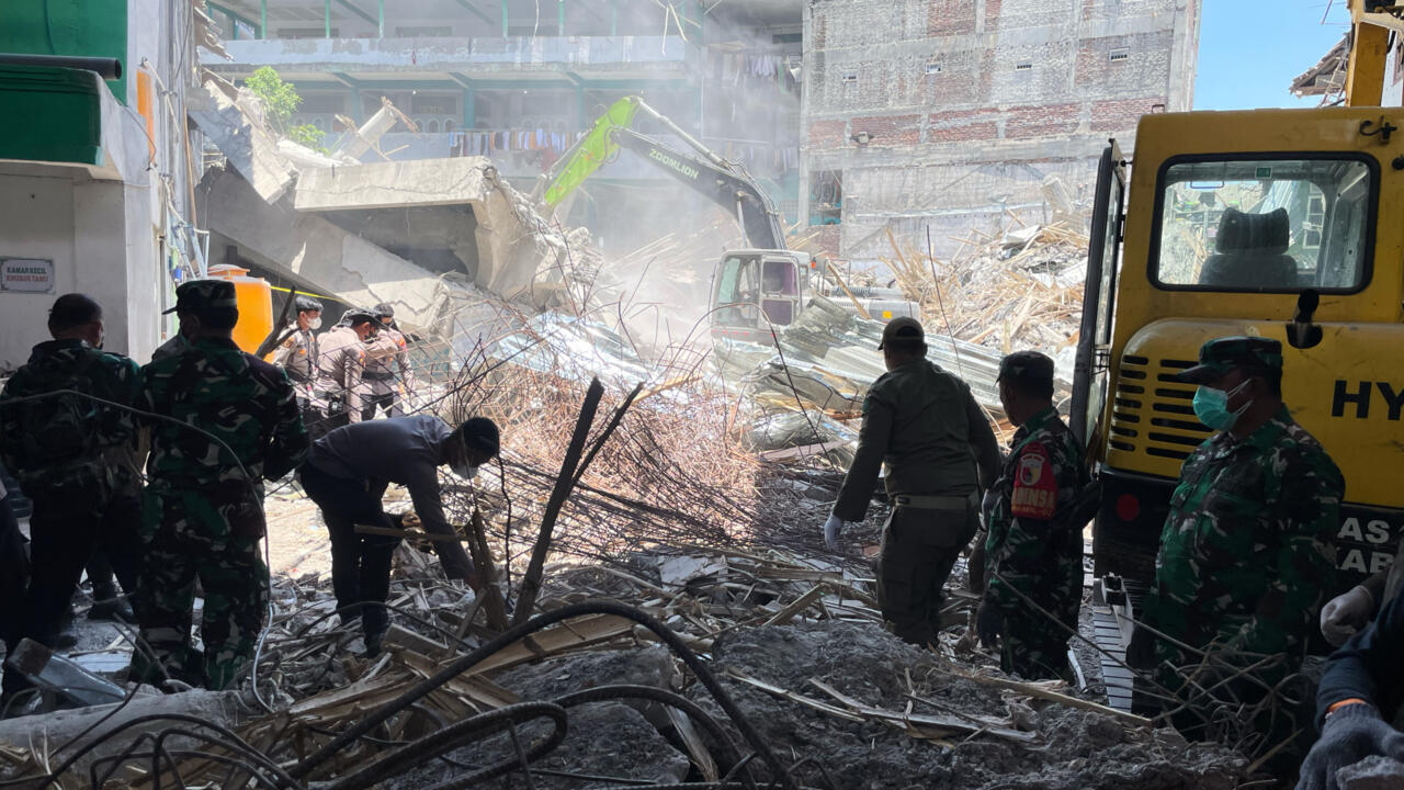 Death toll rises to 14 in Indonesia school collapse, dozens still missing