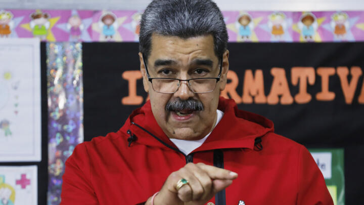 Venezuela's President Nicolas Maduro gestures after marking his ballot during municipal elections in Caracas, Venezuela Sunday, July 27, 2025.