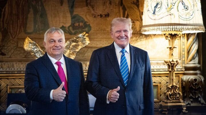 Hungary's Prime Minister Viktor Orban and US President Donald Trump pose for a photo at Trump's estate in Mar-a-Lago in Palm Beach, Florida, on July 11, 2024.