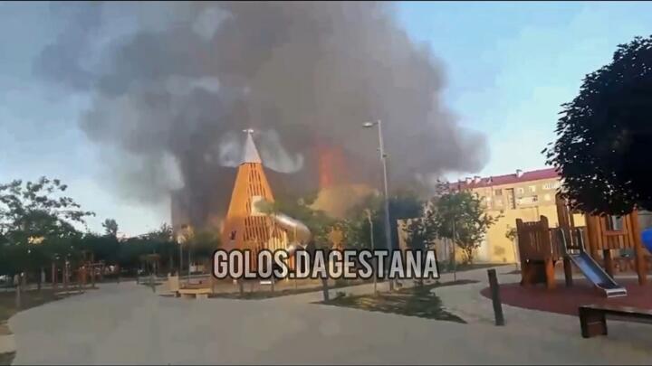 A photo taken from video released by Golos Dagestana shows smoke rising following an attack in Makhachkala, Dagestan, Russia on June 23, 2024.