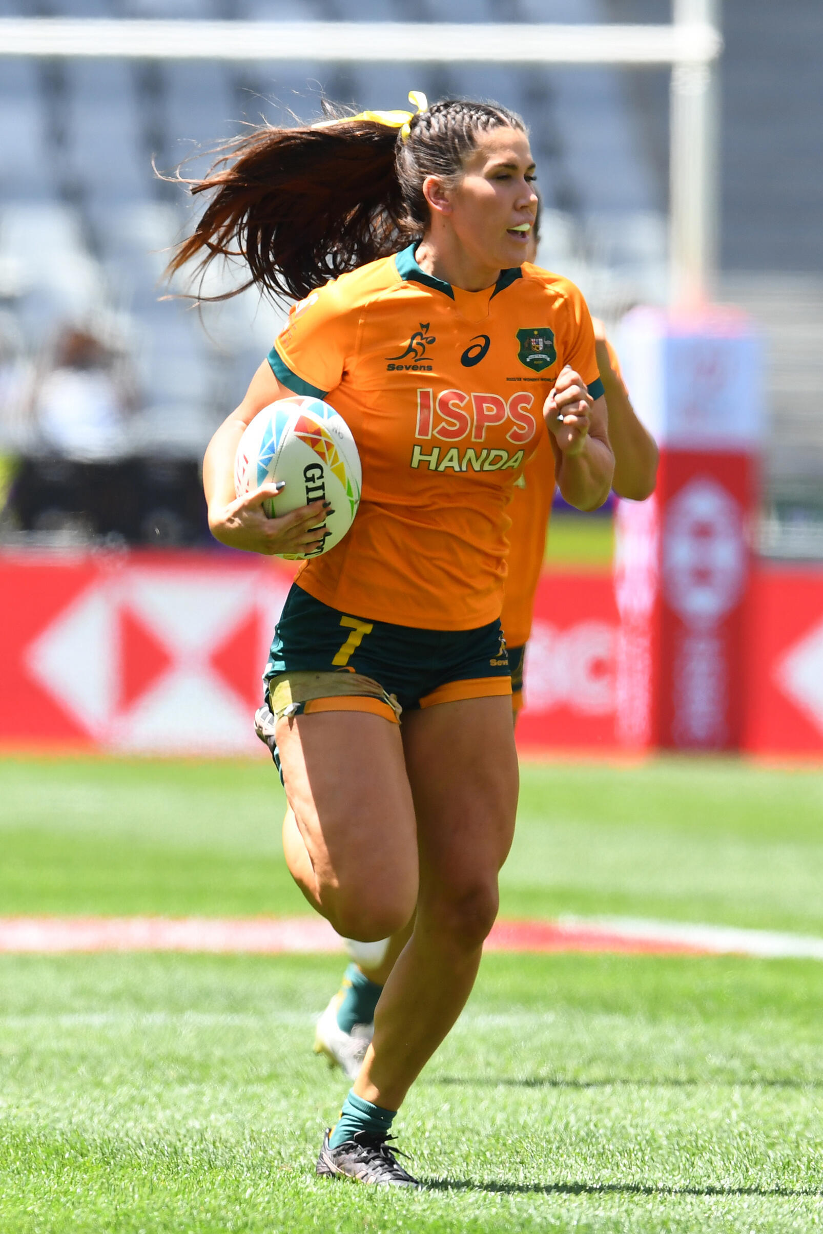 Charlotte Coslick scored Australia's first try in a 52-0 win over South Africa in Cape Town.