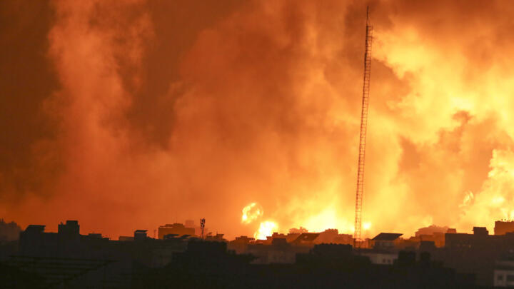 Fire and smoke rises from buildings following Israeli air strikes on Gaza City on November 5, 2023.