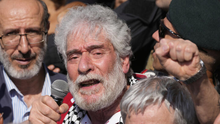 Lebanese pro-Palestinian militant Georges Abdallah speaks to supporters upon his arrival at Beirut's Rafic Hariri International Airport in Beirut, Lebanon, Friday, July 25, 2025.