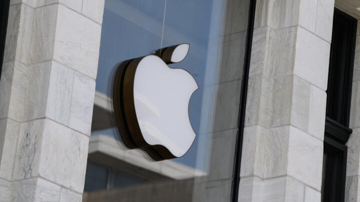 File photo: The Apple logo is seen at the entrance of an Apple store in Washington, DC, on September 14, 2021. 
