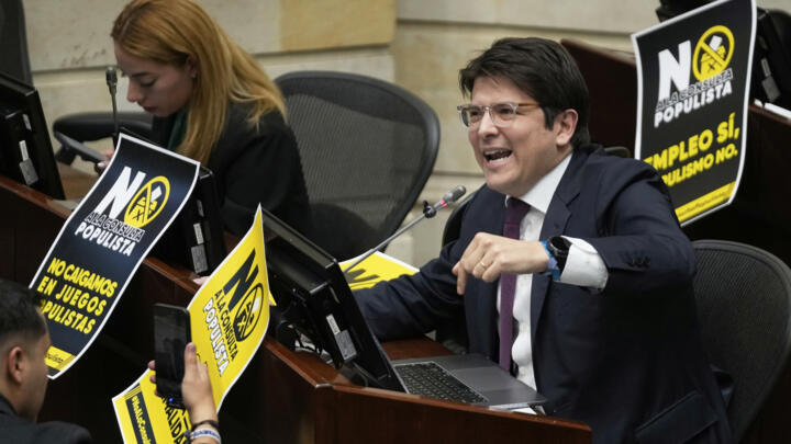 Senator Miguel Uribe, right, discussing a referendum proposal on labor reform, in Bogota, Colombia, May 13, 2025.
