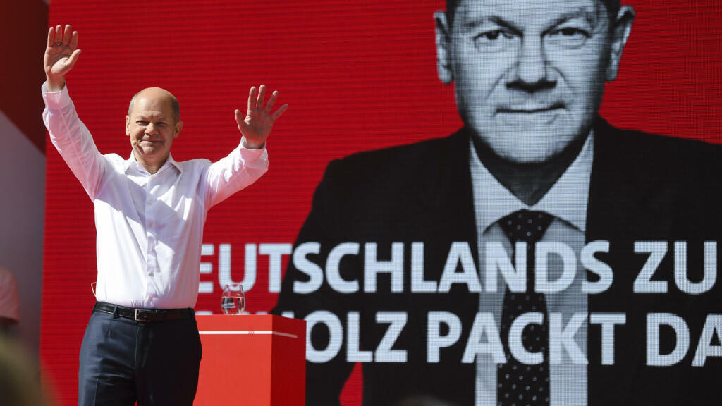 Three German parties reach preliminary deal to form next govt