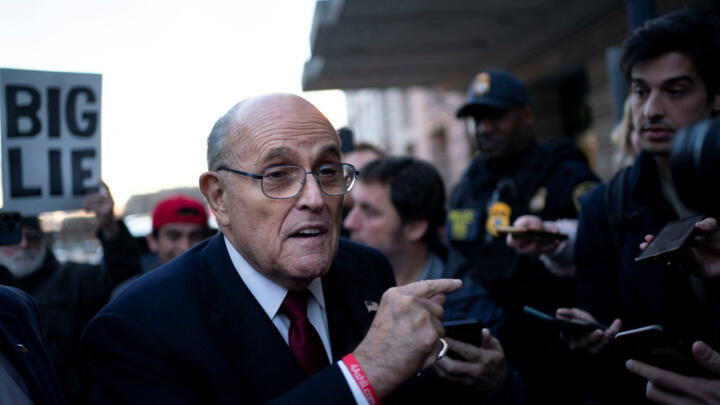 Former New York Mayor Rudy Giuliani departs the US District Courthouse after he was ordered to pay $148 million in his defamation case in Washington, U.S., December 15, 2023.