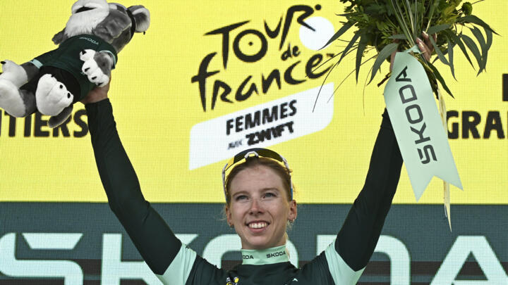 Dutch rider Lorena Wiebes celebrates her green jersey of best sprinter on the podium the 4th stage of the Women's Tour de France cycling race in Poitiers, western France on July 29, 2025.