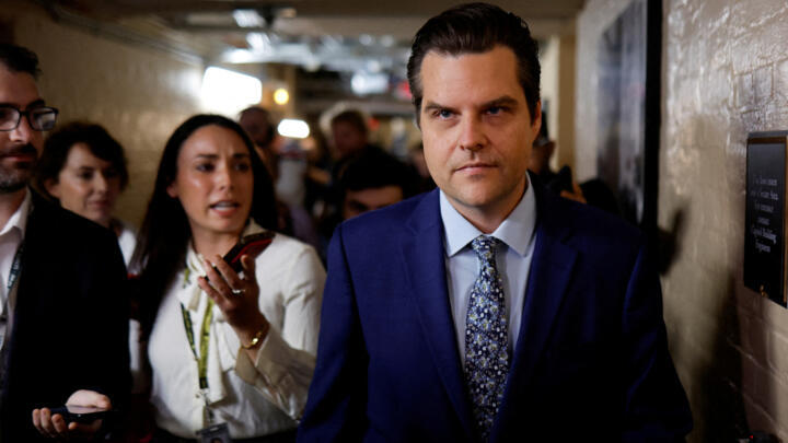 US Representative Matt Gaetz is trailed by reporters after a House Republican conference meeting at the Capitol in Washington on October 3, 2023.