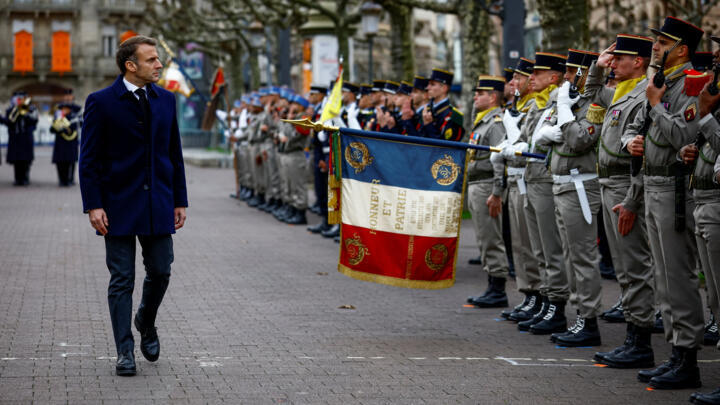 French President Emmanuel Macron reviews the troops at the Place Broglie, during a ceremony to mark the 80th anniversary of the Liberation of Strasbourg, in Strasbourg, eastern France, on November 23.