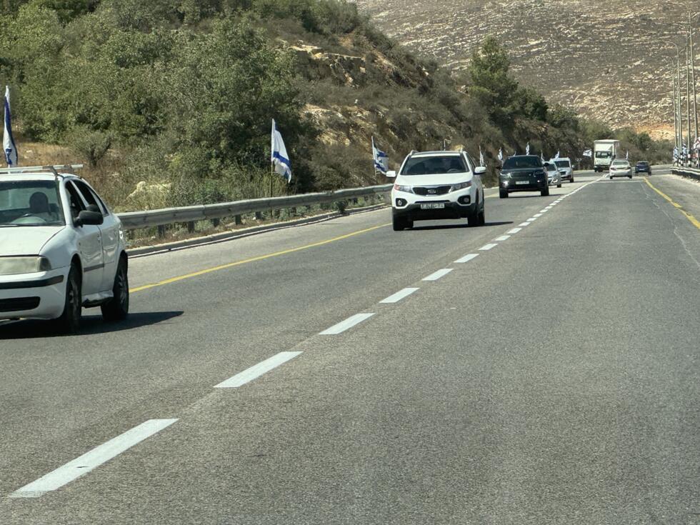 Israeli flags line Route 60 in the West Bank. The flags have been placed there by settlers protesting Western countries’ recognition of the State of Palestine.