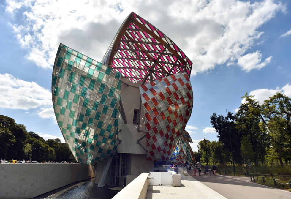 The Fondation Louis Vuitton, designed by architect Frank Gehry, is a soaring glass 'sailboat' in the Bois de Boulogne in Paris