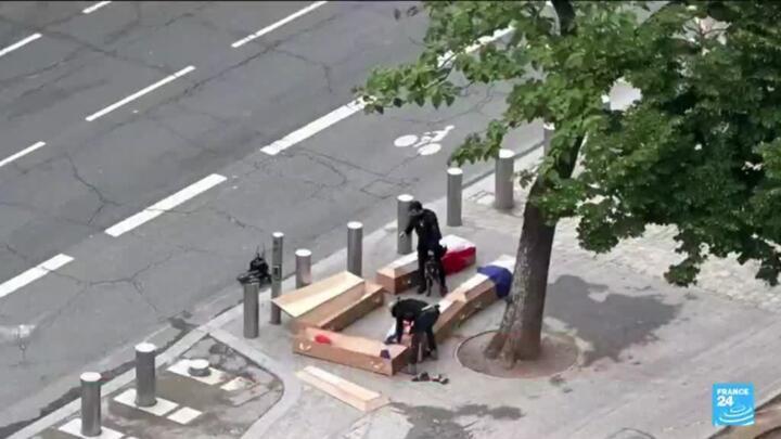 Man held over Eiffel Tower coffins tied to Holocaust memorial graffiti