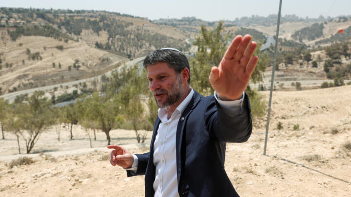Israeli Finance Minister Bezalel Smotrich gives a press conference on settlements expansion in the occupied West Bank on August 14, 2025.