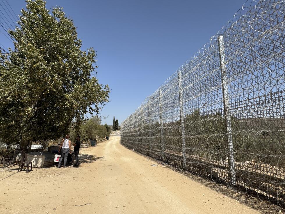 The Israeli military has erected a barbed-wire fence around the village of Sinjil, West Bank.