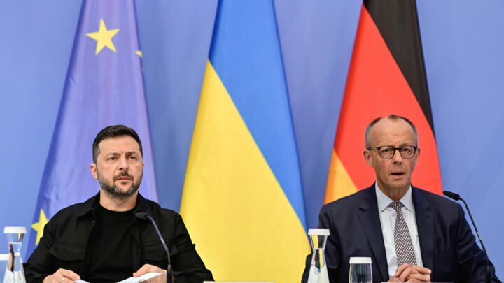 File photo of Ukrainian President Volodymyr Zelensky and German Chancellor Friedrich Merz in Berlin taken August 13, 2025.