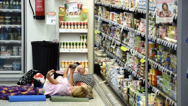 People in Finland slept next to the cooling shelves in a grocery store to escape the heatwave.