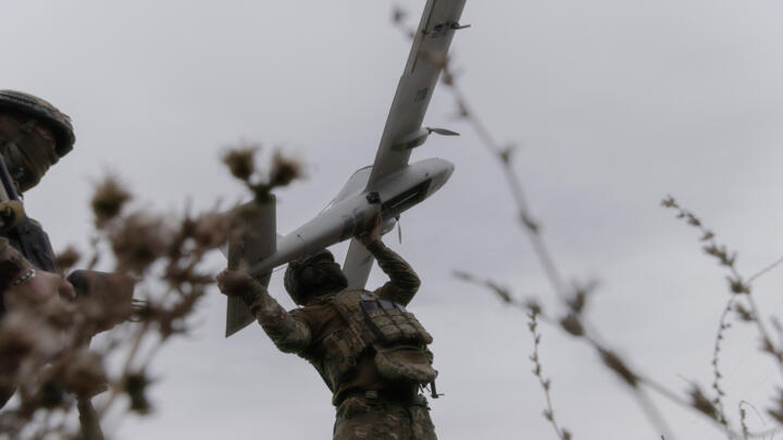 Ukrainian soldiers prepare to launch an Avenger UAV drone in Ukraine's Kharkiv region, Wednesday, Sept. 24, 2025.