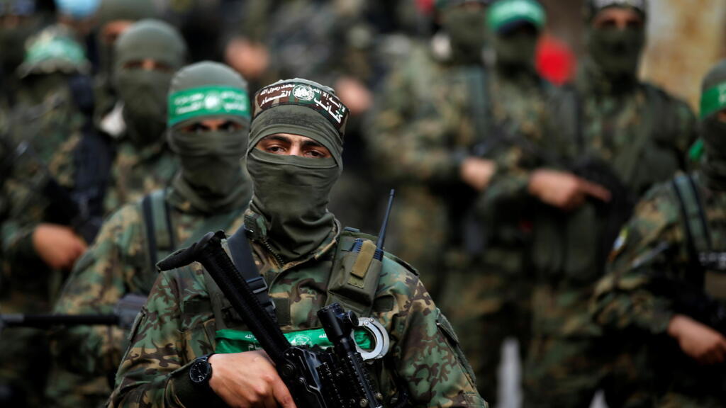 Hamas fighters parade in Gaza as Egyptian mediators try to firm up ceasefire