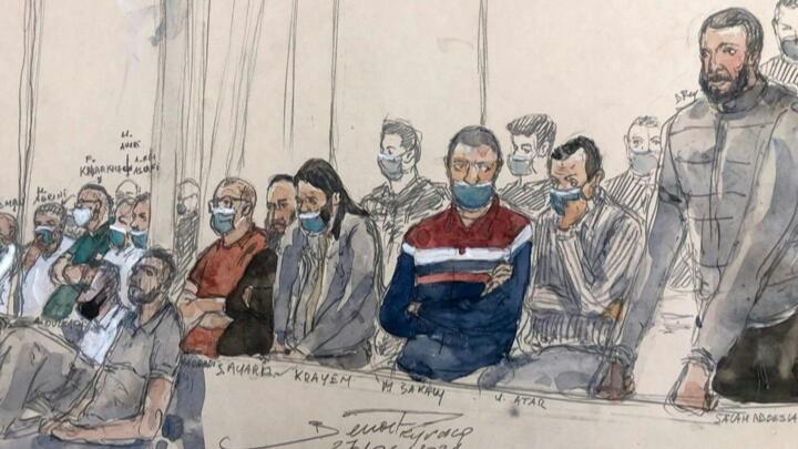 رسم لصلاح عبد السلام والمتهمين الثلاثة عشر الآخرين.