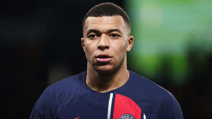 Paris Saint-Germain's French forward #07 Kylian Mbappé looks on during a match at the Parc des Princes stadium in Paris, on December 20, 2023.