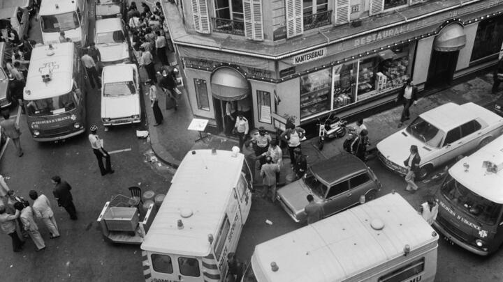 View of firemen and a rescuers in the Rue des Rosiers after the French-Jewish delicatessen restaurant Jo Goldenberg was attacked on August 9, 1982.