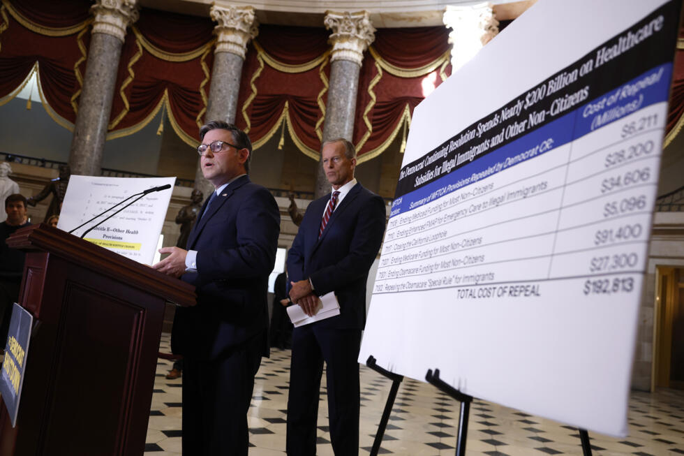 US Speaker of the House Mike Johnson (left), accompanied by Senate Majority Leader John Thune, addresses a news conference at the US Capitol on October 3, 2025 in Washington.
