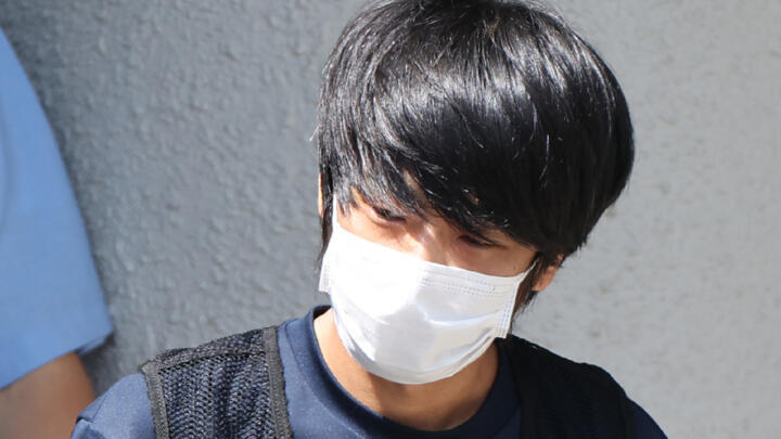 File photo of Tetsuya Yamagami, the man accused of murdering former Japanese PM Shinzo Abe, taken in Nara on July 25, 2022 while being transferred from the Nara Nishi police station.