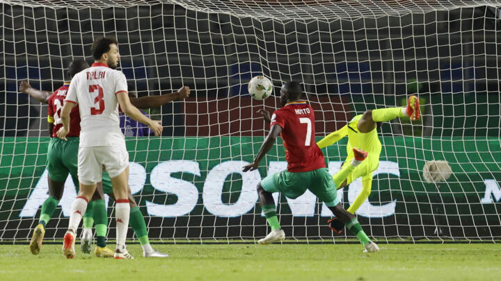 Namibia's Deon Hotto scores the first goal against Tunisia at Stade Amadou Gon Coulibaly in Korhogo, Ivory Coast on January 16, 2024.