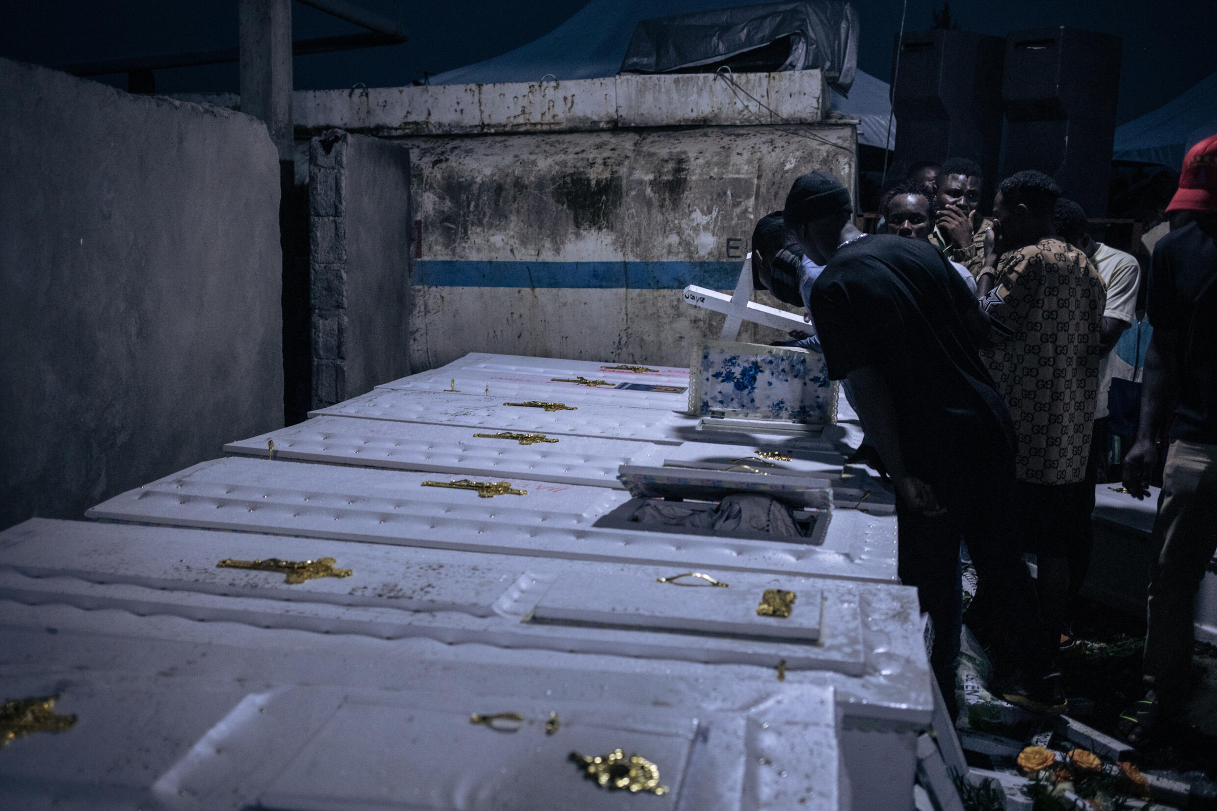 Mourners of those killed by an elite army unit in Goma in August