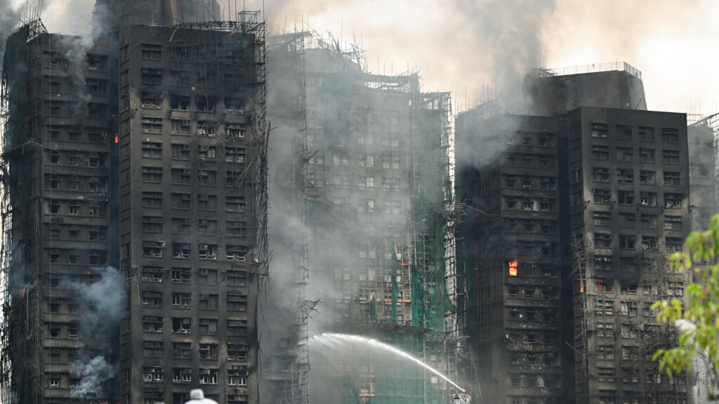 Death toll from huge Hong Kong fire rises to 55 with hundreds still missing