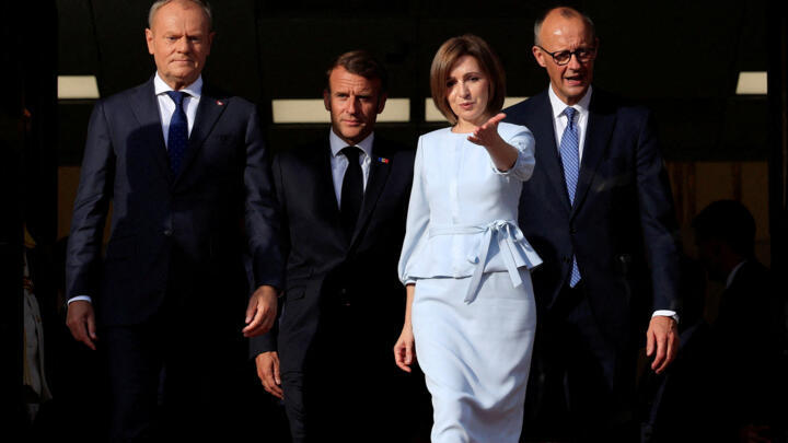 Poland's Prime Minister Donald Tusk, France's President Emmanuel Macron, Moldovan President Maia Sandu, and Germany's Chancellor Friedrich Merz.