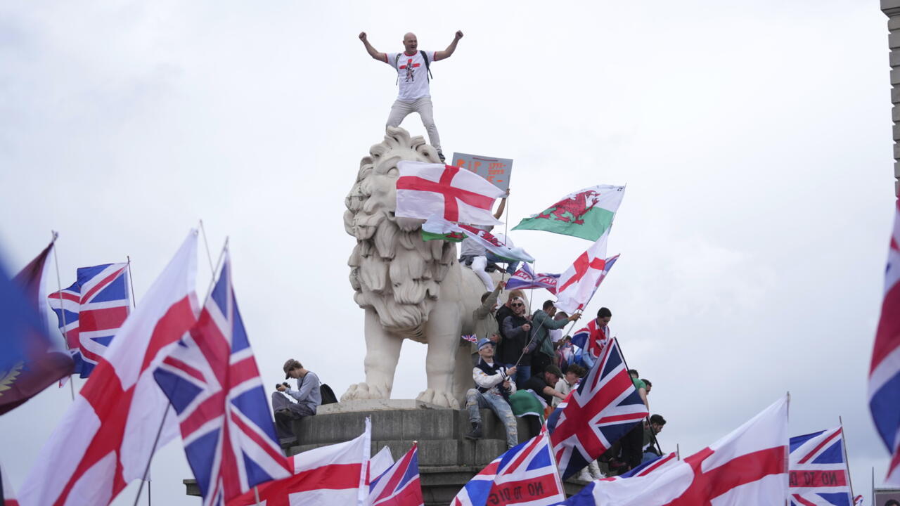 Tens of thousands gather for London anti-immigration rally and counter protest