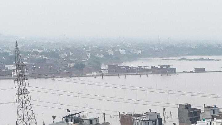 Nearly half a million people were displaced by flooding in eastern Pakistan after days of heavy rain swelled rivers, and authorities carried out a major rescue operation.