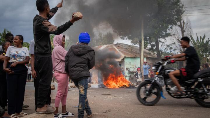People protest in the streets of Arusha, Tanzania, on election day on October 29, 2025.