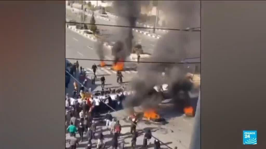 Iranians protest for 12th day as Kurdish opposition calls for general strike