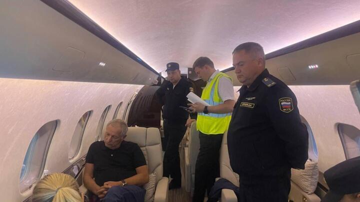 Konstantin Strukov aboard his private plane, immobilised shortly before take-off by airport security.