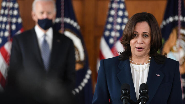 VP Kamala Harris speaks as President Joe Biden looks on during a listening session with Asian American community leaders in Atlanta, Georgia on March 19, 2021.