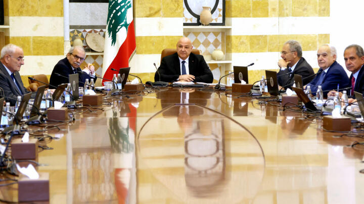 This handout photo released by the Lebanese Presidency press office on August 5, 2025, shows Lebanon's President Joseph Aoun (C) chairing a cabinet session to discuss the issue of disarming Hezbollah.