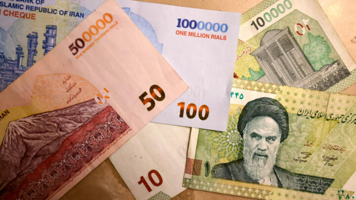 This picture shows new Iranian bank notes of one million, 500,000, and 100,000 rials on August 3, 2025.
