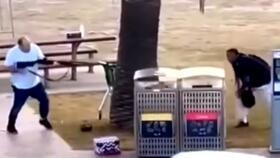 Video footage shows the bystander rushing one of the alleged gunmen who shot dozens of people on Sydney's Bondi Beach on December 14, 2025.