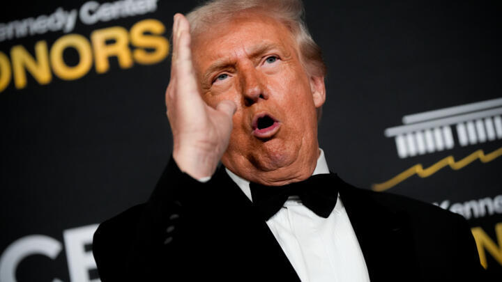 President Donald Trump speaks on the red carpet before the 48th Kennedy Center Honors, Sunday, Dec. 7, 2025,